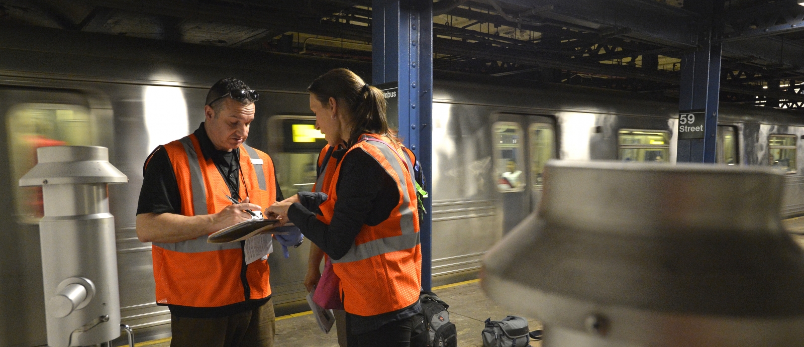 Staff trace the airflow of particles in a New York City subway station. 