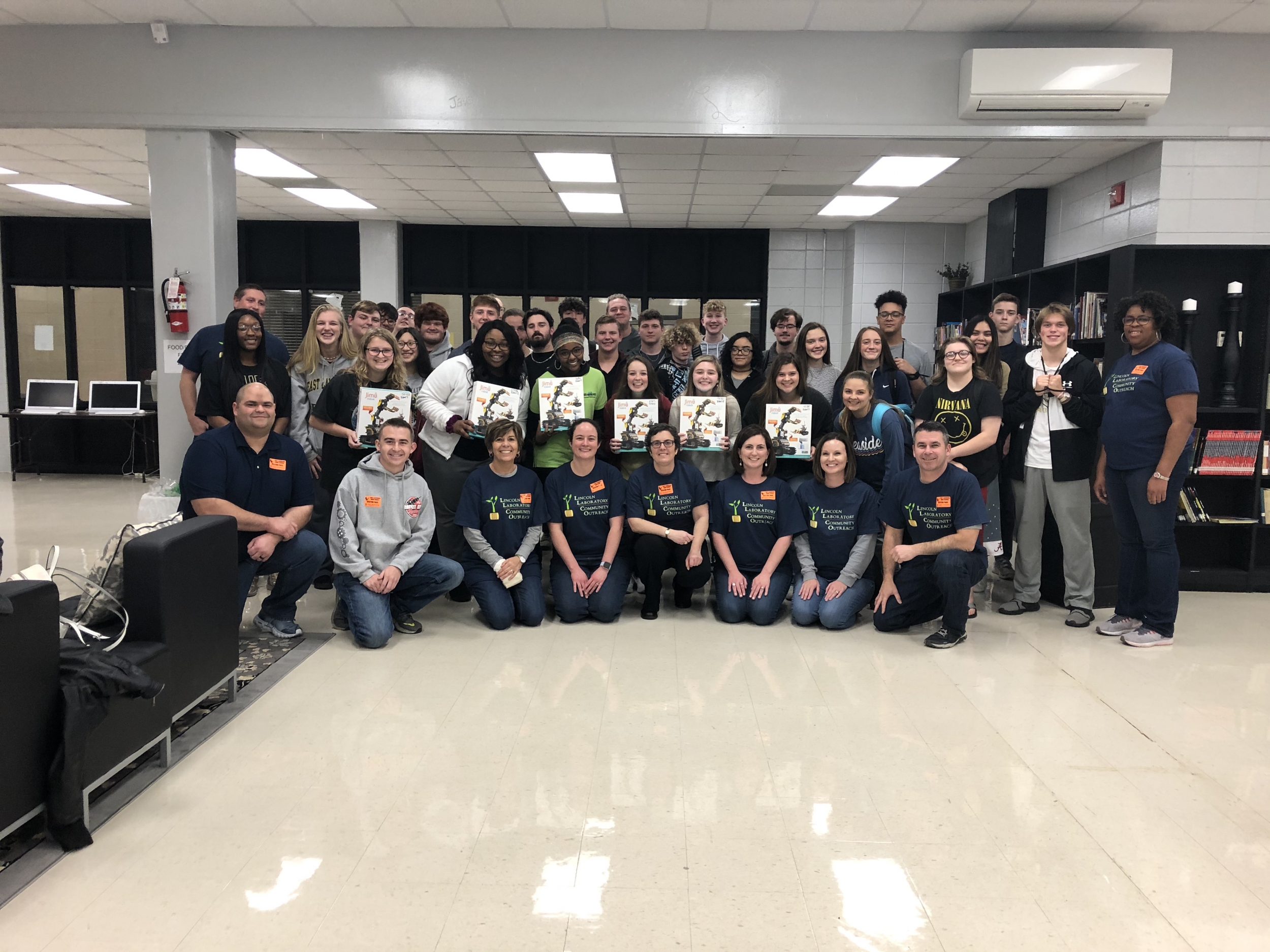 A large group photo comprising around 30 students and 11 Lab staff members