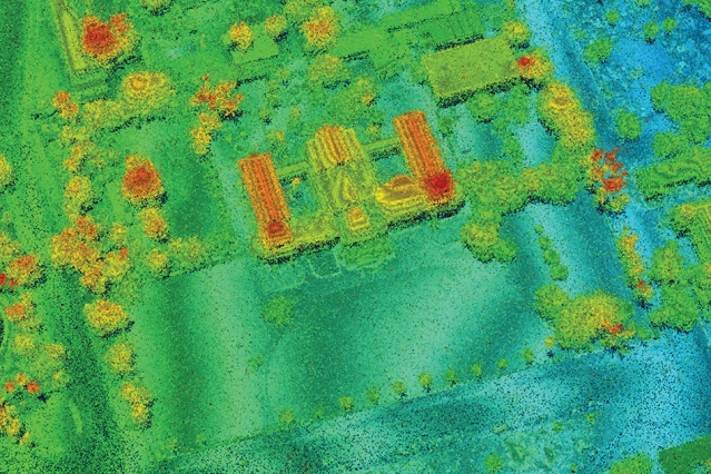 A lidar image, with coloration of green to red for elevation differences, of the National Palace in Haiti. 