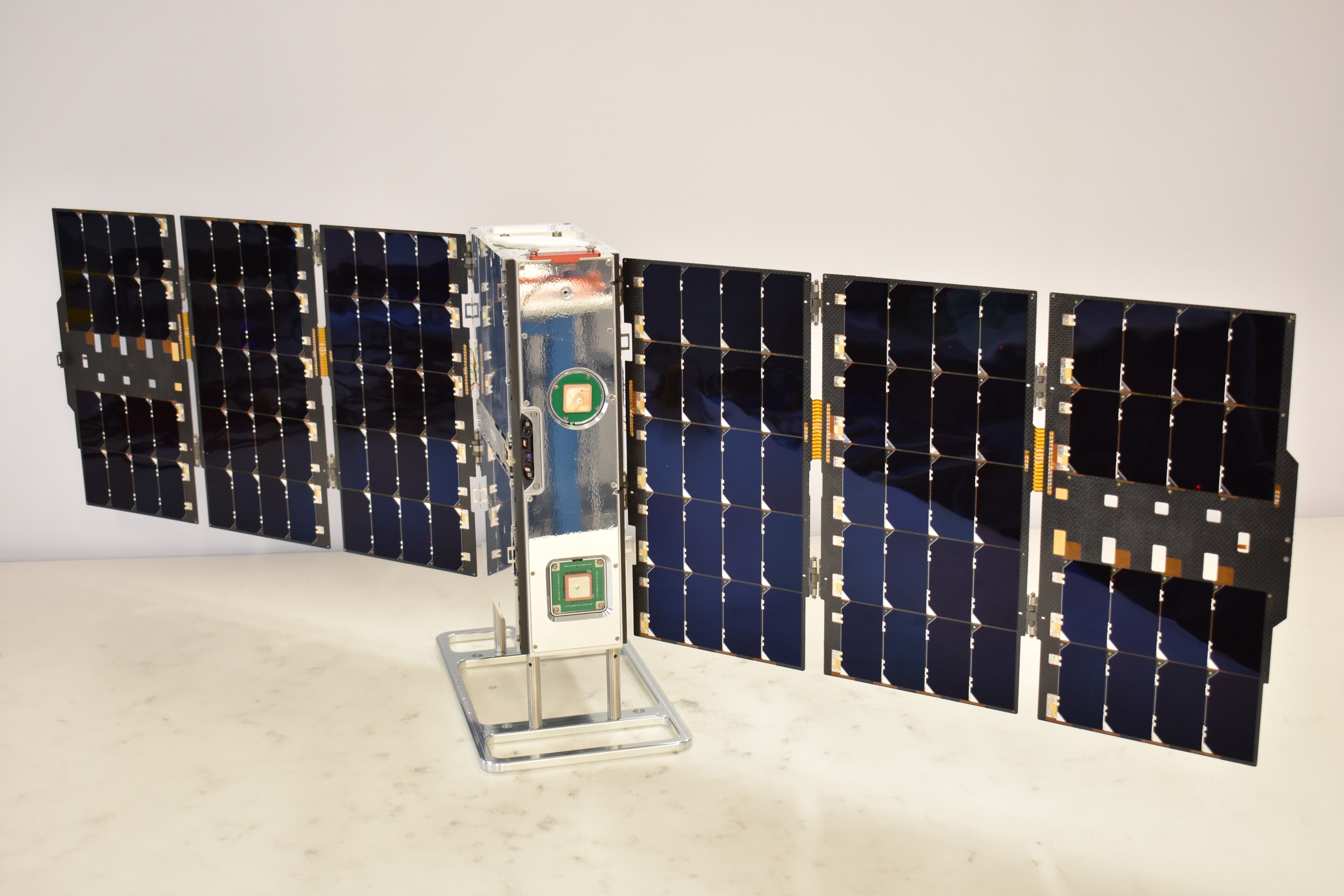Shown is the full AMS satellite with solar panels deployed. 