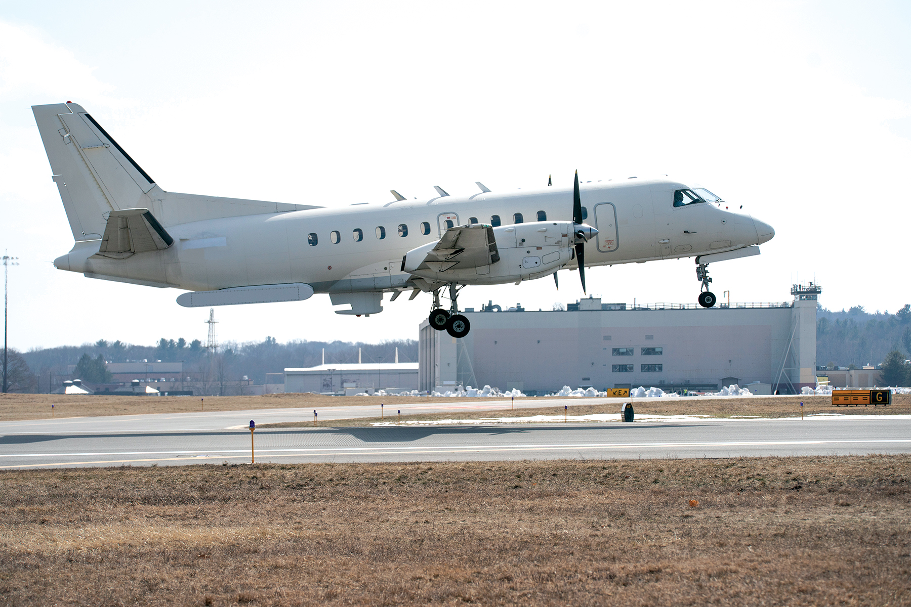 The Saab 340B aircraft outfitted with the Airborne Radar Testbed takes off.