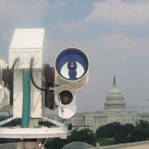 An imaging system setup on a roof with the U.S. Capitol in the background. 