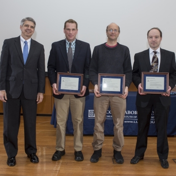 Eric Evans, left, presented the 2016 Best Paper Award to authors, left to right, Shaun Berry, Todd Thorsen, and Jakub Kedzierski. Coauthors Kevin Meng and Rafmag Cabrera were unable to attend the ceremony. Photo: Glen Cooper