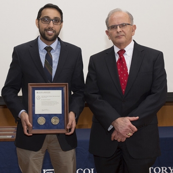 Vijay Gadepally, left, with his citation, is joined by David Martinez, Associate Head, Cyber Security and Information Sciences Division, who introduced Gadepally at the awards ceremony. Photo: Glen Cooper