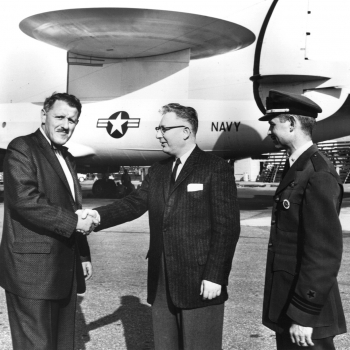 AN/APS-70 AEW radar mounted on a WV-2E aircraft. The 30-foot antenna was the largest airborne antenna of its day. Pictured in the center is Jerome Freedman of Lincoln Laboratory.