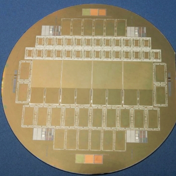 Pictured above is a 150-mm wafer with four CCD imagers in the center. The CCDs will enable the REXIS instrument to image X-rays fluorescing from Bennu's surface.