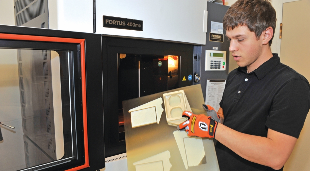 A fused deposition modeling production system in the Rapid Hardware Integration Facility enables staff to build customized thermoplastic parts for prototype systems.