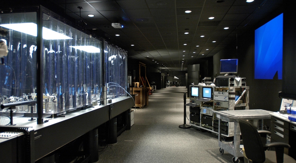 The ladar system on the right was integrated into the active range for testing. At the left is a cleanroom environment.