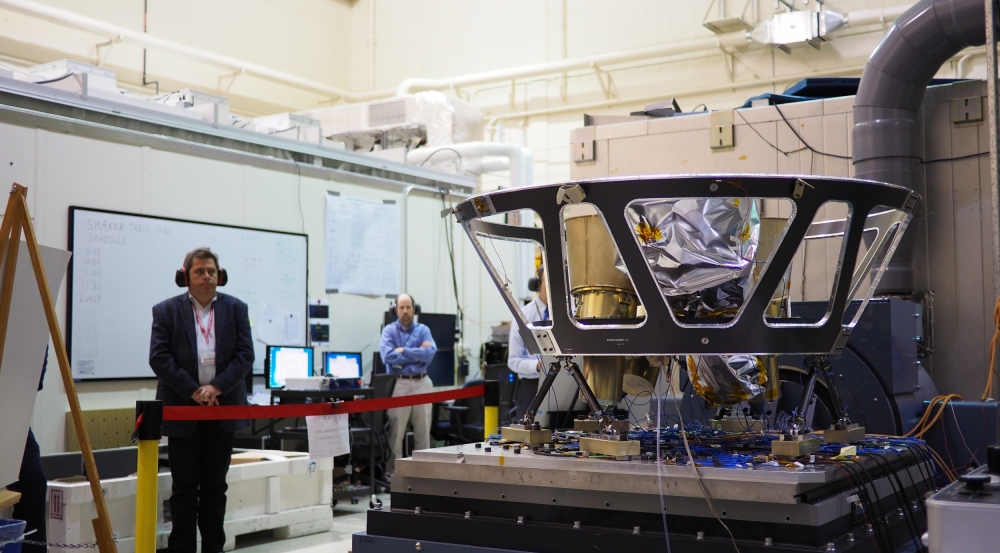 An ETL vibration table with a satellite ready for testing.  