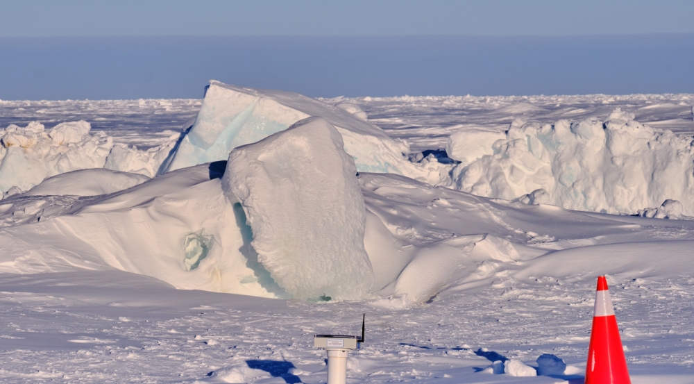 An orange cone warns ice camp participants to not go beyond this point. The Laboratory team placed seismometers on the fringes of camp and as close to ice cracks like this one as they were allowed to go.