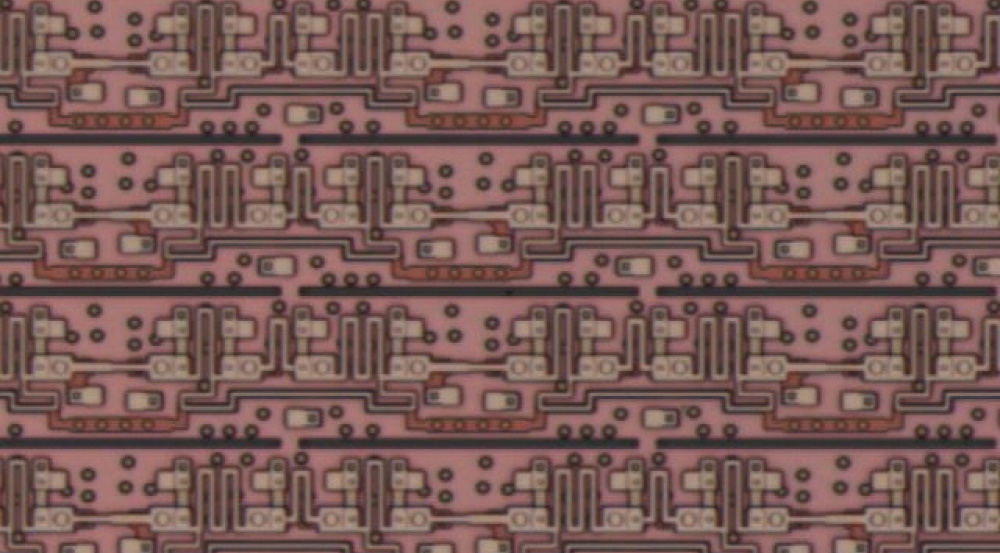 Photomicrograph of superconducting single-flux-quantum (SFQ) shift-register integrated circuit fabricated at Lincoln Laboratory. 