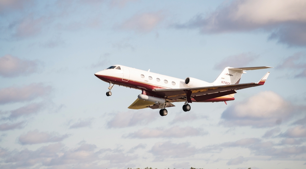 A Gulfstream III aircraft is shown with a PACECR communications pod attached.