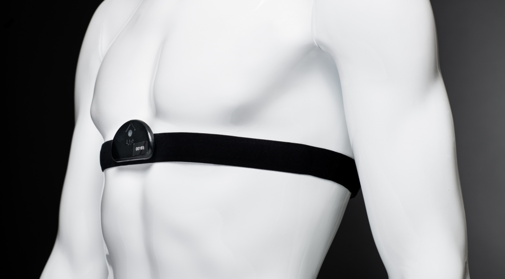 The commercial chest strap is equipped with the Laboratory-prototyped sensor hub. The sensor hub takes physiological measurements, which are used to estimate a strain index. This index indicates if the wearer is at risk for a heat-related illness.