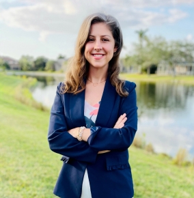 A photo of Amy Grossman standing outdoors.