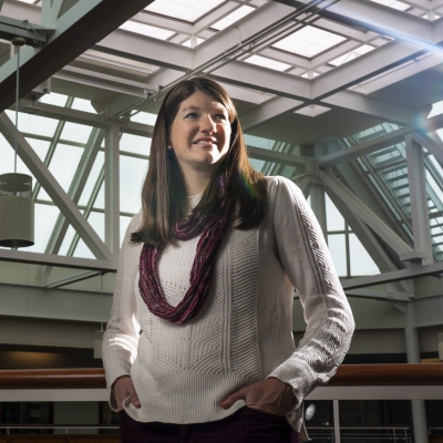 Corrie Smeaton standing in the laboratory's atrium.  