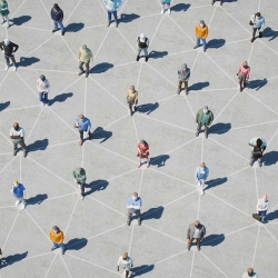 A birds-eye illustration of humans standing in a grid with lines connecting them as if they are "nodes"