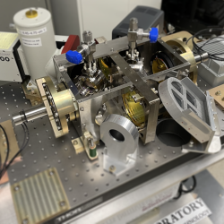 A photo of hardware on a lab bench. 