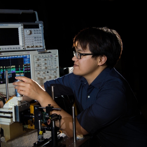 MIT 6-A student Jesse Chang aligns a narrow laser beam on a quad-cell photodetector in preparation for a direct-to-Earth optical communications uplink.