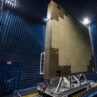 In the large near-field scanner chamber, the full-scale Multifunction Phased Array Radar prototype undergoes beam pattern testing. 