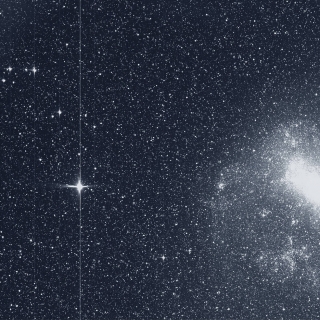 Captured image of the Large Magellanic Cloud and bright star R.