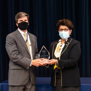 Jovita Carranza, the 26th Administrator of the U.S. Small Business Administration, presents the Dwight D. Eisenhower Award for Research and Development to Scott Anderson, Assistant Director for Operations. Photo: Nicole Fandel