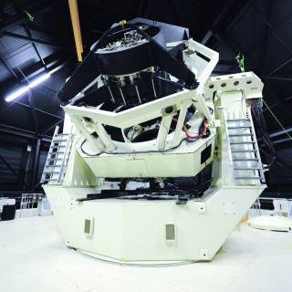 This is a photo of the Space Surveillance Telescope inside a facility at its original site on the White Sands Missile Range in New Mexico.  