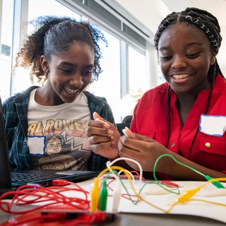 Young girls build a closed circuit during a G.I.R.L. workshop