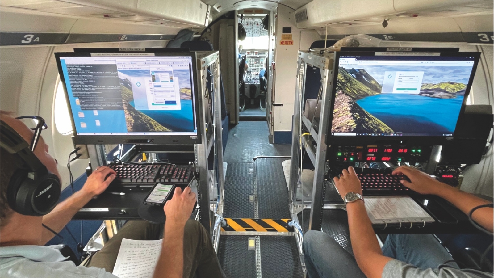 A photo of two operators on an aircraft using the Laboratory's Airborne Radar Testbed to command a radar to test and demonstrate intelligence, surveillance, and reconnaissance radar concepts.