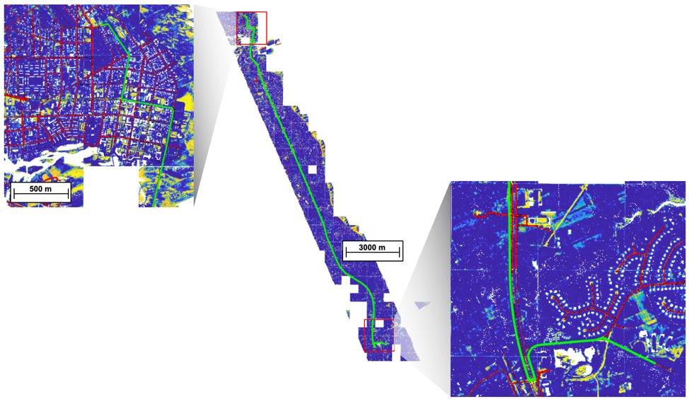 A photo of a lidar map ofa 400 sq mile area, with roads highlighted red, the ground blue, and a navigational route is green. 