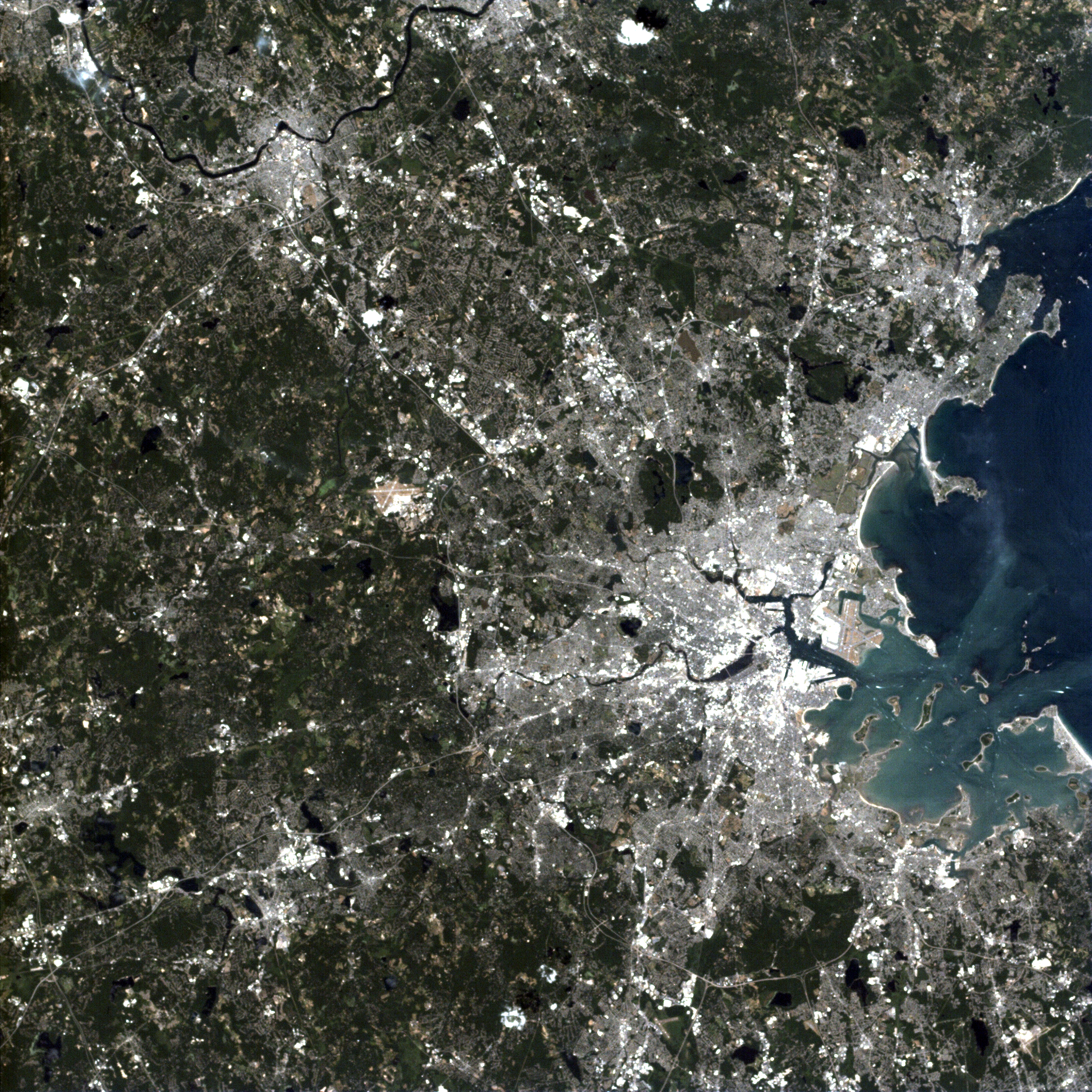 AMS took a photo of Boston on July 10. Hanscom Air Force Base can be seen northwest of the city center and the Haystack Observatory is further to the west.