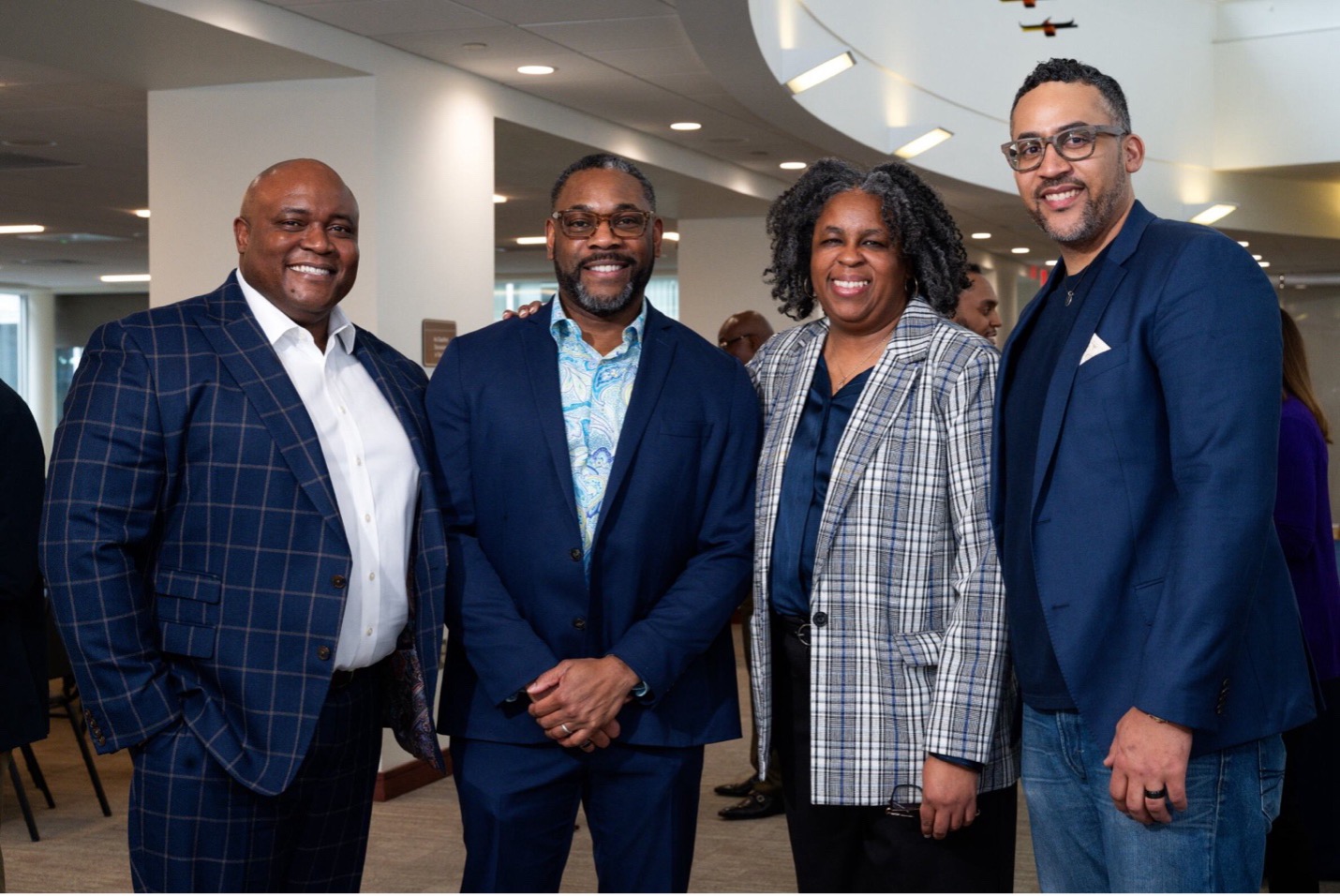 From left to right, Alexander Lupafya, Chief Diversity and Inclusion Officer, poses with BEACON co-chairs Gibbs, Agbasi-Porter, and Johnson.