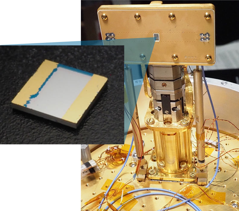 An image of a brass/metal optical system, with an inset image of a small square of lab-grown diamond material.