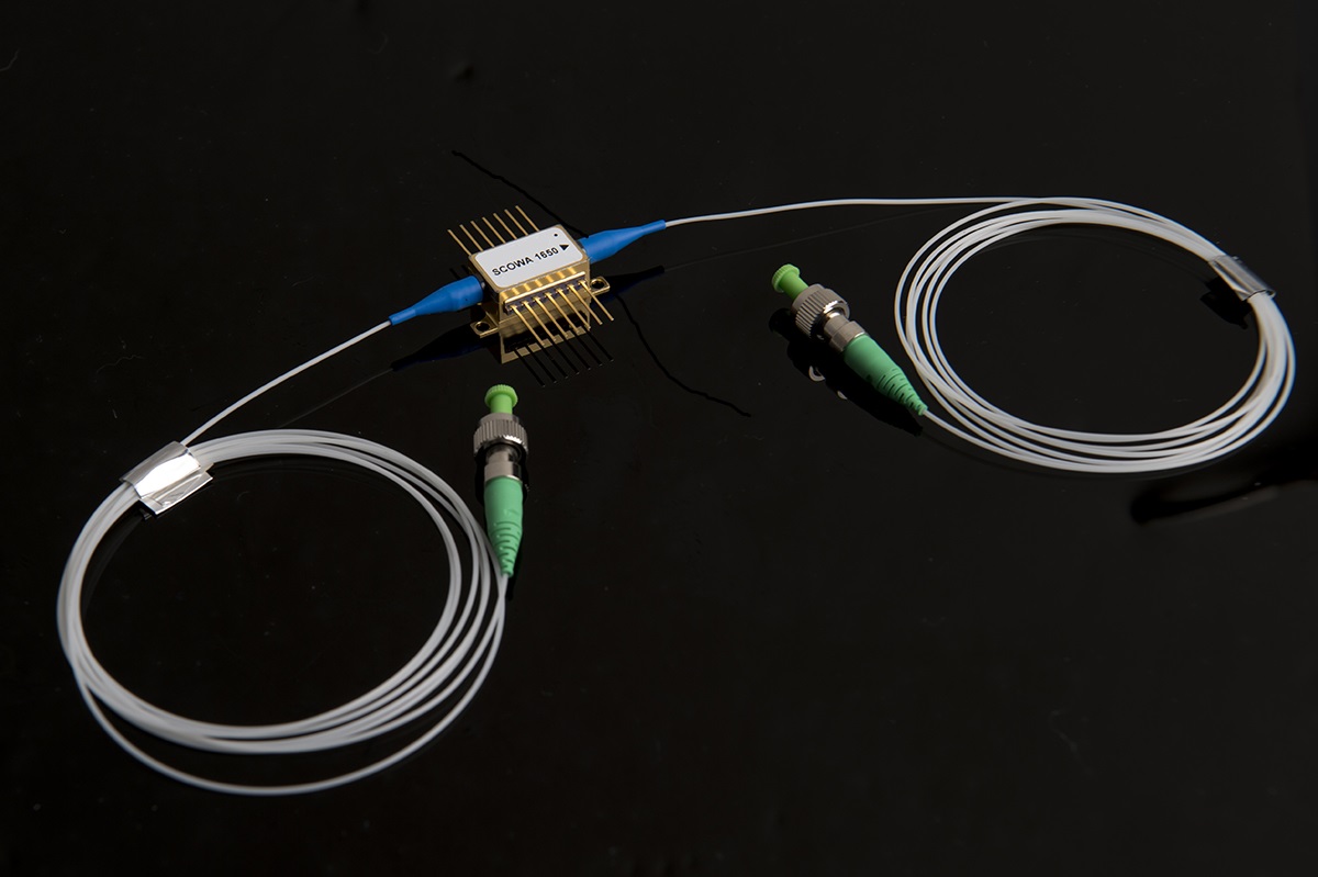 A packaged 1.65-micron slab-coupled optical waveguide amplifier (SCOWA)