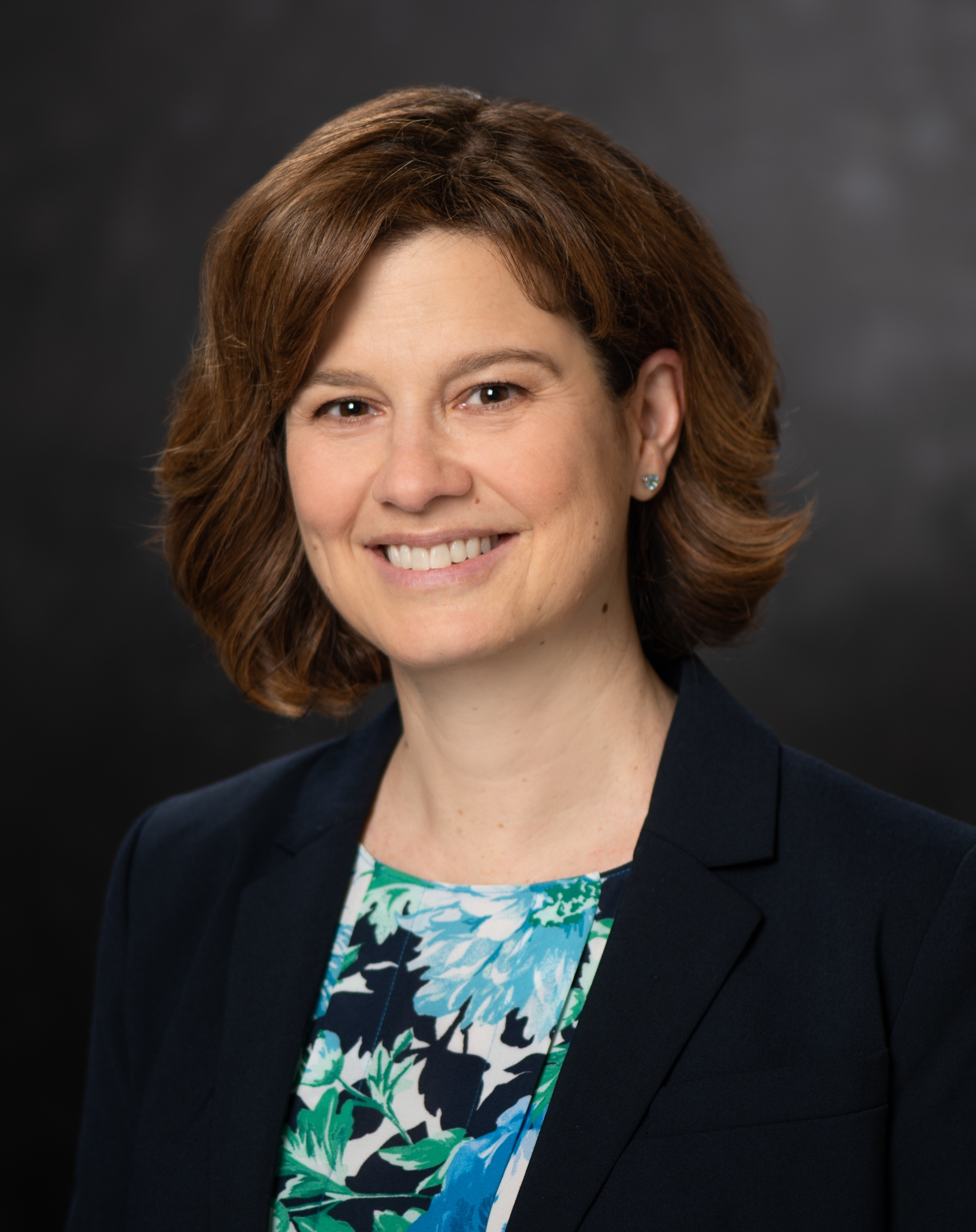 A portrait photograph of Pamela Evans.