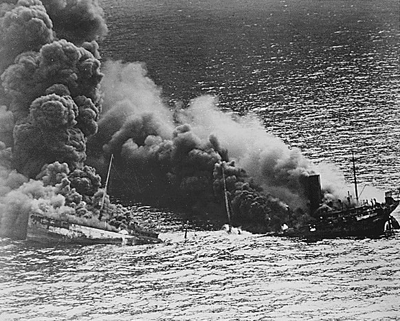 Allied tanker burning following U-boat attack.