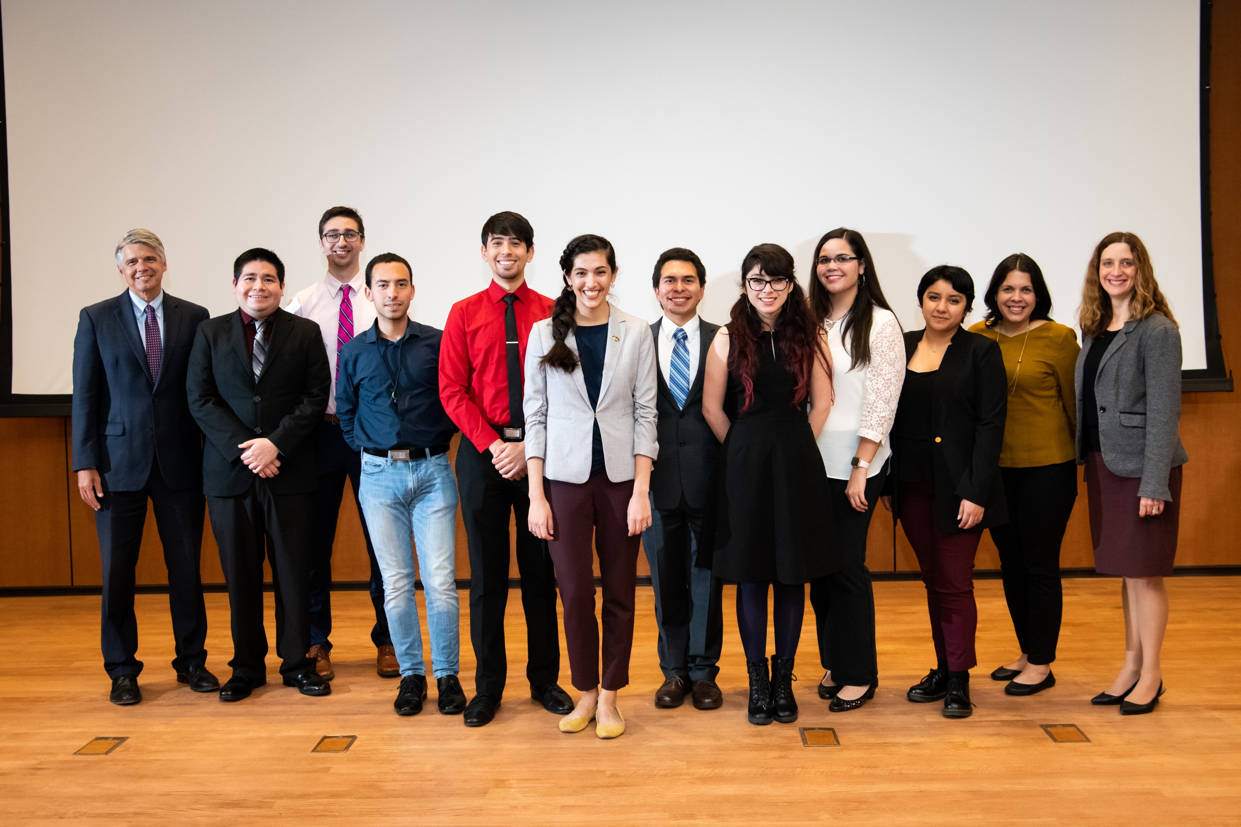 Members and supporters of LLHLN gathered with MIT researcher Natalia Guerrero after her keynote address at LLHLN's annual Hispanic Heritage Month event.