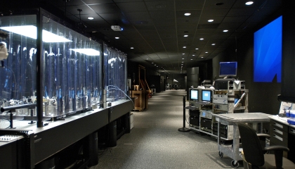 The ladar system on the right was integrated into the active range for testing. At the left is a cleanroom environment.