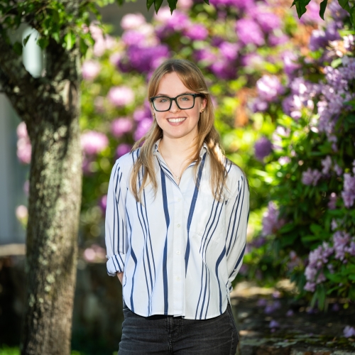 An outdoor portrait photograph of Emma Kotar. 
