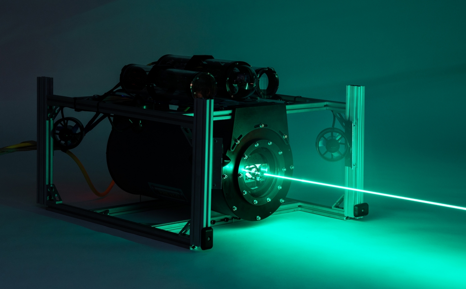 Pictured is the undersea vehicle emitting a beam.