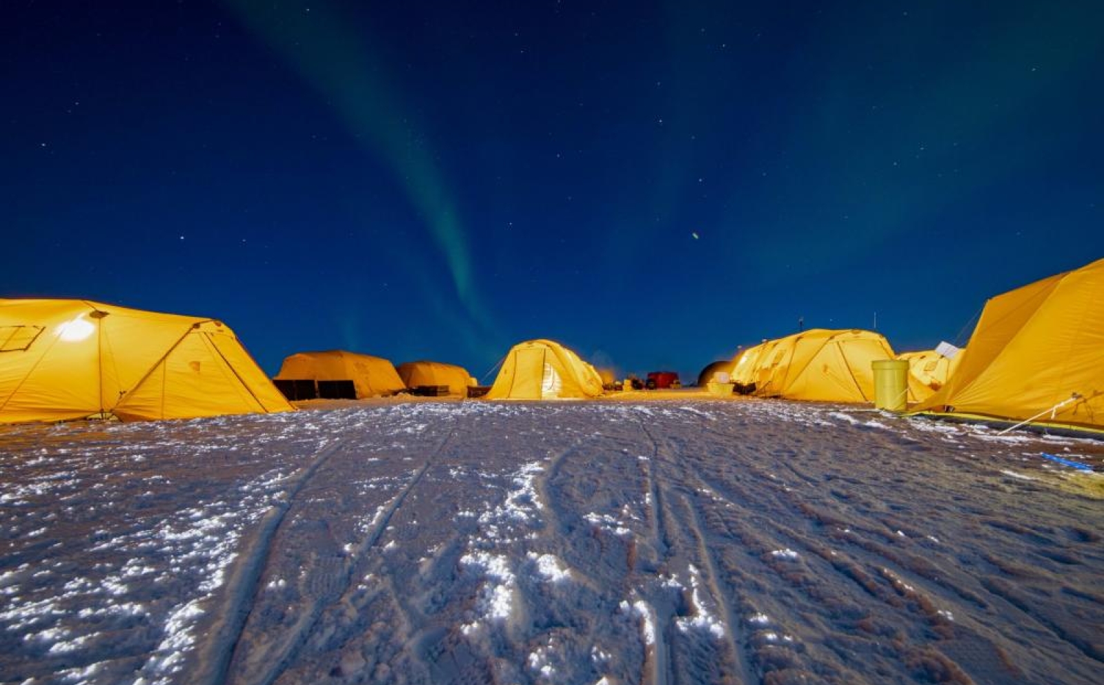 The Northern Lights illuminate the Arctic sky over Ice Camp Queenfish. Credit: U.S. Navy Petty Officer 1st Class Cameron Stoner.