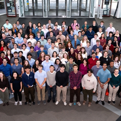  A group of approximately 170 interns take a group photo in the Lincoln Laboratory lobby.