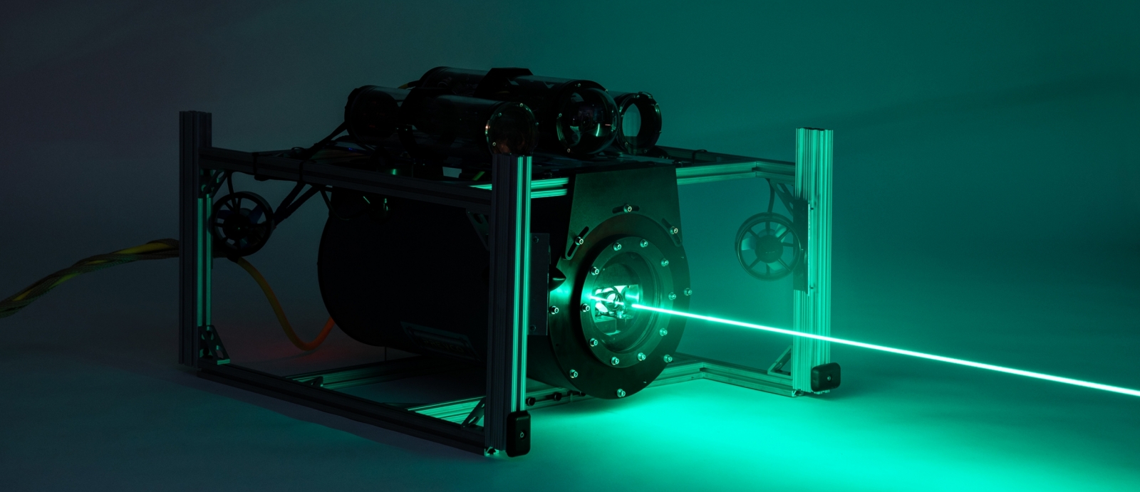 Pictured is the undersea vehicle emitting a beam.