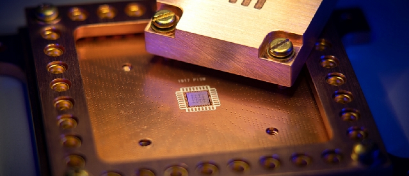 A photo of a computer chip with MIT etched into it