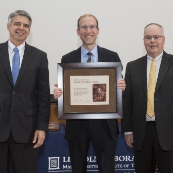 Robert Atkins, right, Head, Advanced Technology Division, introduced Daniel Ripin, center, at the awards ceremony; Director Eric Evans presented the award. Photo: Glen Cooper