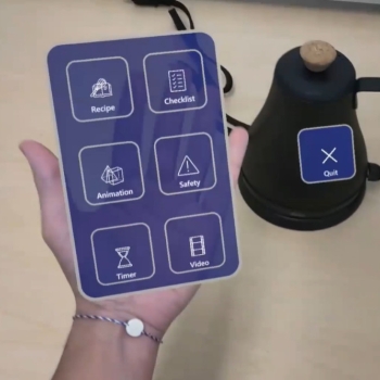 A person's hand holding a "virtual" menu as seen through a VR headset.