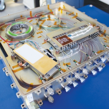 Space-qualified fiber and electro-optics hardware shown here generates and receives multi-rate DPSK waveforms.