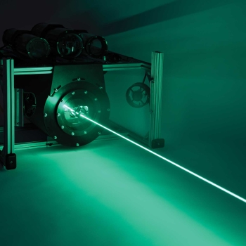 Photo of low-power laser beam that enables high-speed, low-observable links between undersea vehicles and through the air/sea interface.