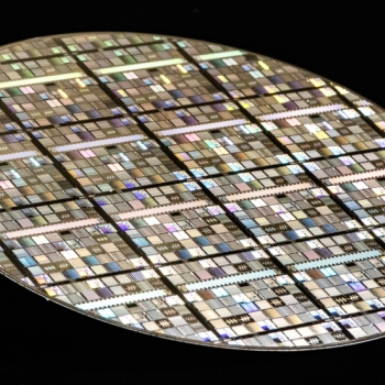 Photo of a superconducting qubit wafer