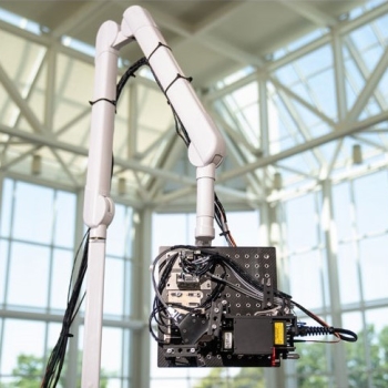 This photo shows the NCLUS optical head, which houses a miniaturized laser source and receiver, flexible optical fibers, mirrors, and a camera.