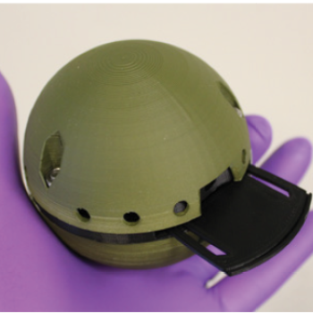 Photo of small chemical sensor held in a hand